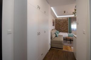 Ένα ή περισσότερα κρεβάτια σε δωμάτιο στο Lux Apartman Petrovic