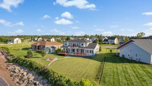 an aerial view of a house with a large yard at Harbour View Haven in Stratford