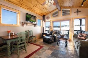 a living room with a couch and a table at 1247 County Road 200 in Pagosa Springs