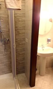 a bathroom with a shower and a sink at Cozy!! Verona in Verona