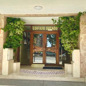 an entrance to an office building with a glass door at Ducado 41 Playa in Benidorm