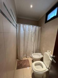 Een badkamer bij Departamento Cabernet, 4 Huésped by Inside