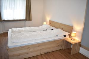Postel nebo postele na pokoji v ubytování Rhodania A 3003 Kl + 12 fotografií