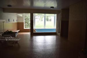 Bazén v ubytování Rhodania A 3003 Kl nebo v jeho okolí
