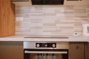 A kitchen or kitchenette at Apartman K29