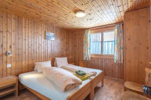 Postel nebo postele na pokoji v ubytování Appartmenthaus Bergfreund