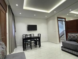 Телевизия и/или развлекателен център в Residence Al-Bahr