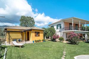 Vonkajšia záhrada v ubytovaní Woodpecker House Lefkada