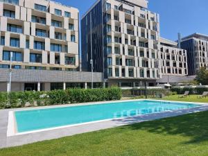 The swimming pool at or close to Ramada Plaza by Wyndham Milano