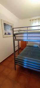 Postel nebo postele na pokoji v ubytování MSJ 69 Bonito dúplex en Marina Sant Jordi