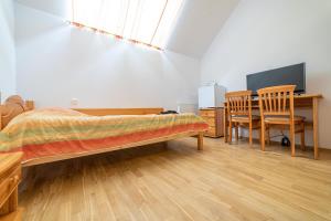 Postel nebo postele na pokoji v ubytování Ośrodek Wrzosowa Góra - pokoje