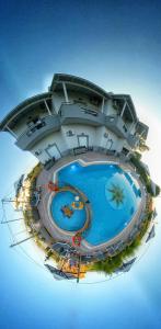 an aerial view of a cruise ship with a pool at Harma Corfu in Sidari