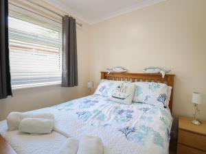 En eller flere senge i et værelse på 41 Siesta Mar Chalet Park