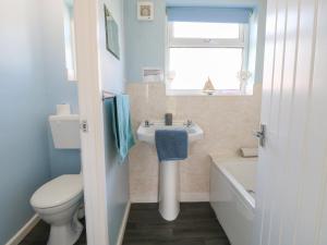 Et badeværelse på 41 Siesta Mar Chalet Park + 9 billeder