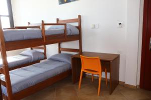 Postel nebo postele na pokoji v ubytování Student's Hostel Parma
