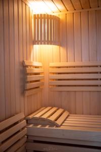 a sauna with two wooden beds in it at Bella Monte in Szczyrk +109 photos