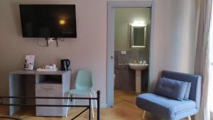 TV o dispositivi per l'intrattenimento presso Cconforthotels R&B Suite&Chic