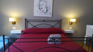 Letto o letti in una camera di Cconforthotels R&B Suite&Chic