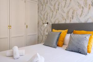 Granadi Apartamentos客房内的一张或多张床位