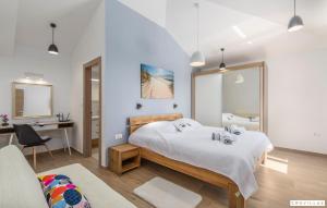 Postel nebo postele na pokoji v ubytování Lucija + 37 fotografií