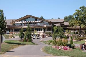 a large building with a road in front of it at Lake Geneva's resort amenities in Lake Geneva