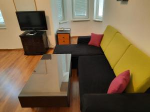 TV a/nebo společenská místnost v ubytování Studio Cathlyn