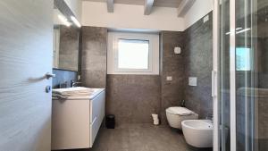 Koupelna v ubytování Calle - Larihome A37