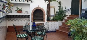 Balkón nebo terasa v ubytování Casa Luciíta: Agradable con chimenea, patio y BBQ.