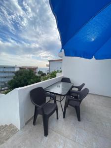 Balkón nebo terasa v ubytování Guest House in Utjeha