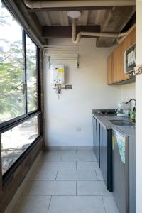 Kuchyň nebo kuchyňský kout v ubytování M1145 Aparta Loft