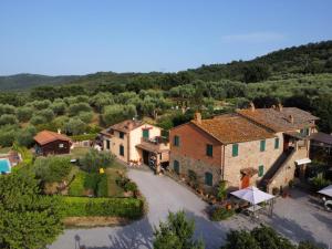 an aerial view of a house with a pool at La Piaggiola degli Olivi in Panicale