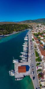 an aerial view of a marina with boats in the water at Penny's Beach Cottage in Galaxidi +9 photos
