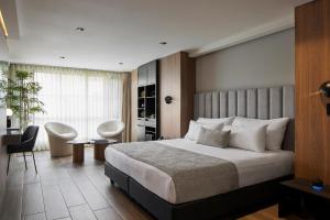 Voodi või voodid majutusasutuse Hotel Selis toas