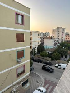 a view of a city street from a building at Apartment City Center Best Price in Fier