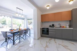 Kuchyň nebo kuchyňský kout v ubytování Apartman Suzi