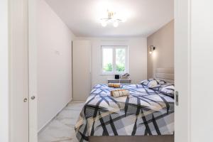 Postel nebo postele na pokoji v ubytování Apartman Suzi
