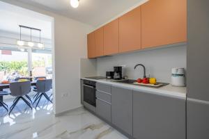 Kuchyň nebo kuchyňský kout v ubytování Apartman Suzi