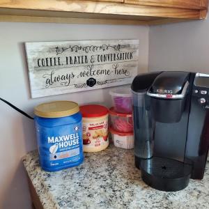 a kitchen counter with a coffee maker and confusion always intolerance hate at Relaxing Stay Near the Beach in Hampton