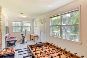 a room with a large foosball table in it at Renovated Louisiana Rental Near Mississippi River 