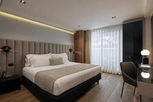 Voodi või voodid majutusasutuse Hotel Selis toas