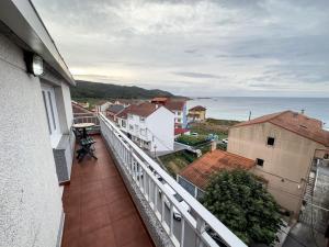 a balcony of a house with a view of the ocean at Casa Gonzalo in Arou