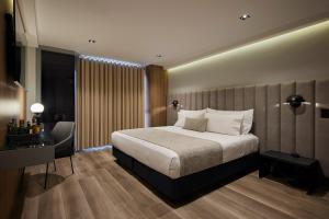 Voodi või voodid majutusasutuse Hotel Selis toas