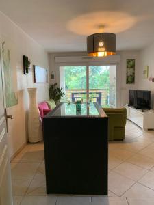 Posedenie v ubytovaní Votre séjour cosy à Frejus!