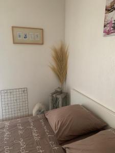 Posteľ alebo postele v izbe v ubytovaní Votre séjour cosy à Frejus!