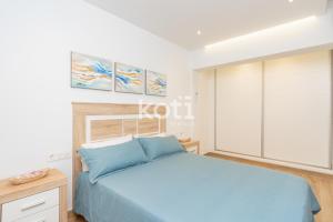 Кровать или кровати в номере Koti Rentals - Casita Rosario Pino Rooftop y Bbq
