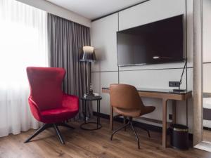 TV a/nebo společenská místnost v ubytování Radisson Blu Royal Viking Hotel, Stockholm