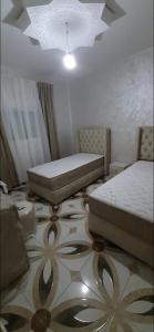 Rúm í herbergi á S&R Appartements