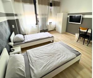 Postel nebo postele na pokoji v ubytování 4RENT Apartments - Monteurzimmer
