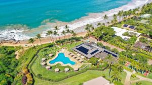 an aerial view of a resort with a swimming pool and the ocean at Wailea Ekahi Village - CoralTree Residence Collection in Wailea