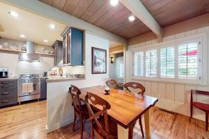 a kitchen with a wooden table and chairs at Villager Retreat in Sun Valley